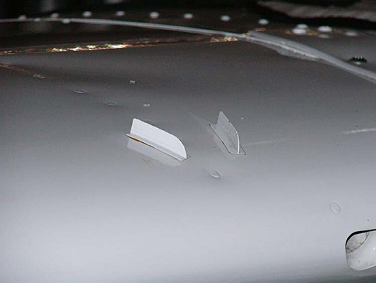 Aftermarket Micro Dynamics vortex generators mounted on the wing of a Cessna 182K