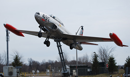 The Canadair CT-33 aircraft mounted in front of the main terminal building