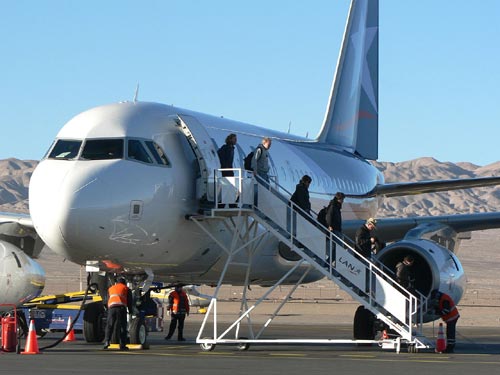 Passengers disembarking a flight from Santiago in 2008 