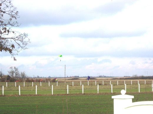 Parachutists over Čenej Airport