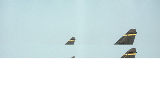 
An air-to-air view of three Vought A-7D Corsair II aircraft in formation during Exercise TEAM SPIRIT'86 on 1 March 1986. The aircraft belonged to the 185th Tactical Fighter Group, Iowa Air National Guard, based at Sioux Gateway Airport in Sioux City, Iowa (USA), which flew the A-7D from 1977 to 1992.