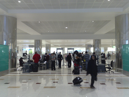 Aerial shot of the airport showing runway, taxiway and terminal layout