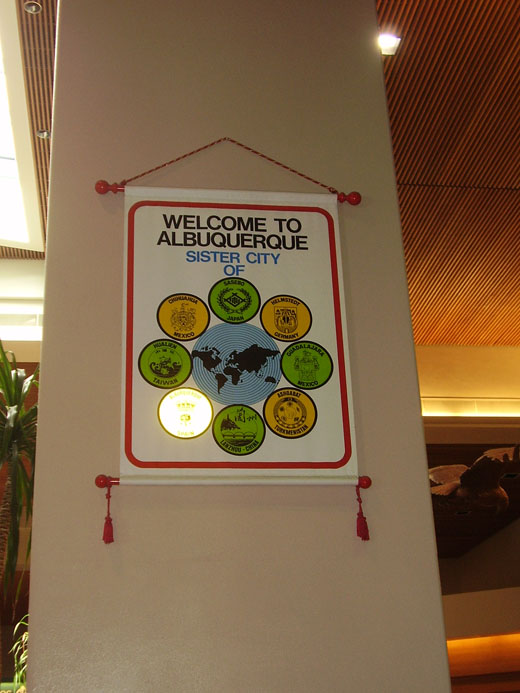 
Banner inside the airport terminal listing Albuquerque's sister cities