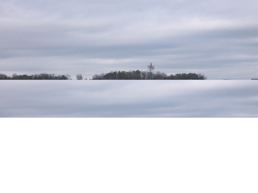 
An Alabama Air National Guard KC-135 departs Runway 6-24 in front of the Air National Guard hangars.
