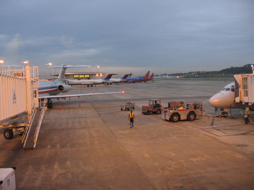 
Seven narrow body mainline airplanes start the day at Birmingham International Airport in May 2008. From left to right as viewed from American Airlines Gate B1: American Airlines MD-80 (Dallas-Fort Worth), two Delta Air Lines MD-88s (Atlanta), three Southwest Airlines Boeing 737s, and a Northwest Airlines DC-9 (Detroit) (Northwest moved to Concourse C in May 2009 and merged with Delta)