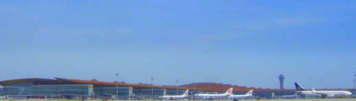 
Terminal 3-E from airfield and Air China planes parked at the terminal