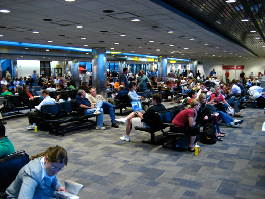 
Passengers wait in Terminal C for a storm to pass