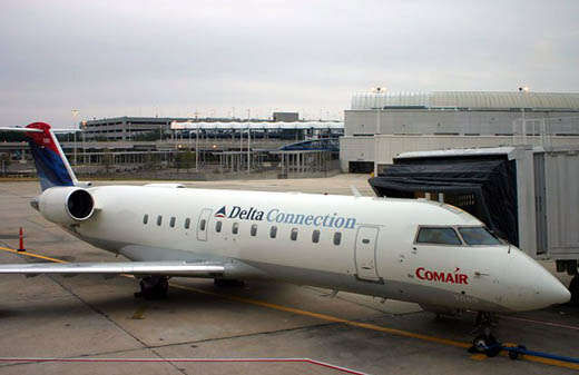 
A Delta Connection flight (operated by Comair) parked at the gate at the old Concourse A