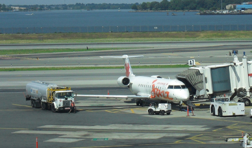 
Air Canada Jazz CRJ being fueled at La Guardia Airport