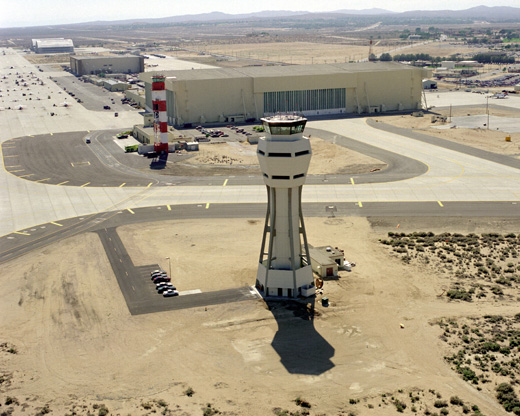 
A 1987 aerial view of the control tower with an older tower in the background