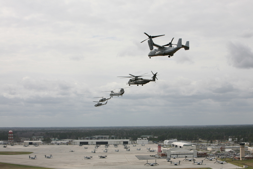 
From right, a V-22 Osprey, a CH-53E Super Stallion, a CH-46 Sea Knight, a UH-1N Huey, and an AH-1 Cobra fly in formation over Marine Corps Air Station New River, North Carolina, March 18, 2008.