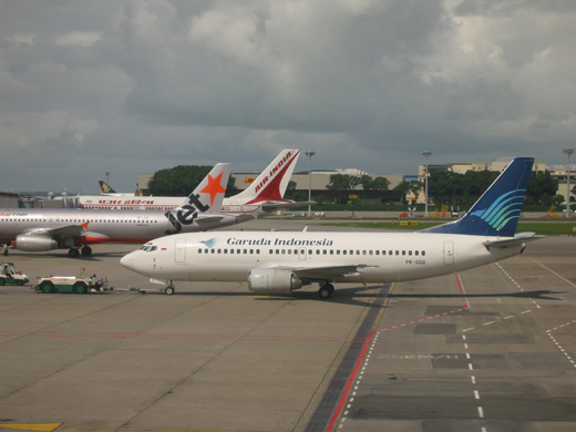
A Garuda Indonesia Boeing 737-300 bound for Jakarta, Indonesia pushing back at Singapore Changi Airport, Singapore.