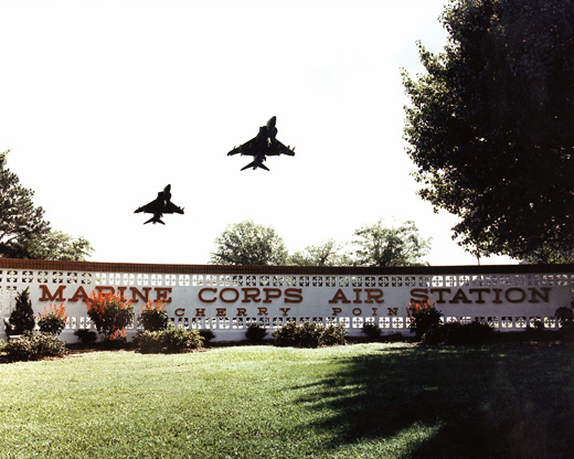 
Harriers from VMA-231 over the front sign of the air station in 1990.