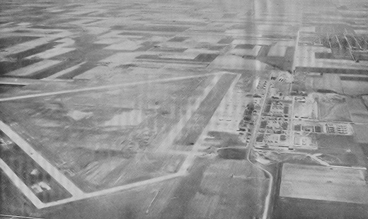 
Oblique airphoto of Harvard Army Airfield, 1945, looking south along the flightline.