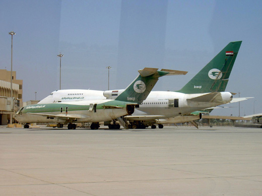 
An Iraqi Airways Boeing 727-200 and Boeing 747SP stored at Baghdad International Airport. (2003)