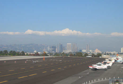 
Facing east at the city and landing aircraft.