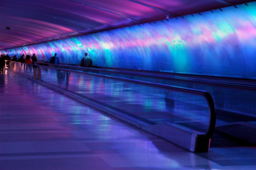 
Detroit's colorful Light Tunnel connecting Concourse A with Concourse B/C in the McNamara Terminal. Light patterns along the tunnel are choreographed with music.