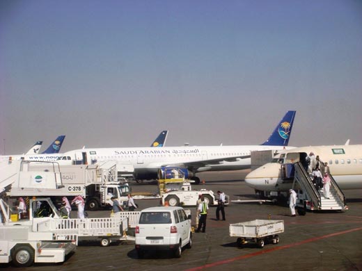 
View of chartered airliners in temporary Saudi colours, on Apron on a busy day of the 2008 Hajj Season. Also seen, a scheduled Saudi E-70 and Iran Air A300 in the foreground and background respectively.