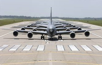 
Boeing KC-135 Stratotankers based at McConnell in formation as they taxi down a runway.