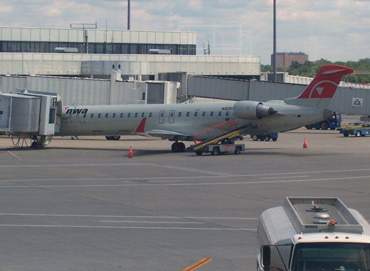 
Northwest Airlink CRJ-900 at gate B3 in 2009, being prepared for a flight to Detroit Metropolitan Airport.