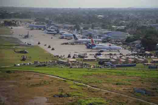 
Relief operations crowd the tarmac, January 18.