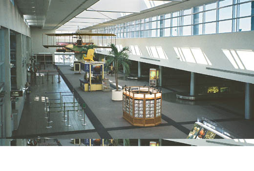 
Baggage Claim Area (completed in 2000), which has a replica of the Benoist XIV flying boat flown by aviation pioneer Tony Jannus in 1914