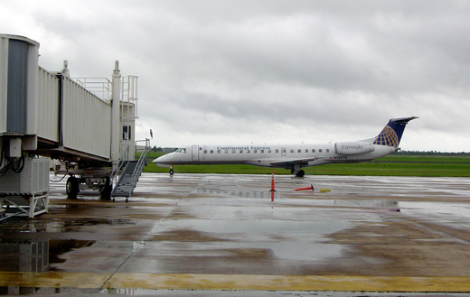 An ExpressJet Airlines ERJ 145 arriving at the Gate 2 jetway.