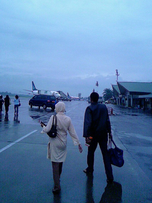
Passengers on tarmac at Polonia Airport