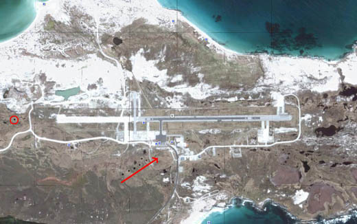 
Present-day Port Stanley Airport. Craters from the Falklands War. The white extension is no longer used.