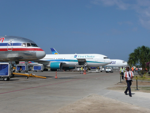 
Aircraft parked at several gates adjacent to Terminal 1
