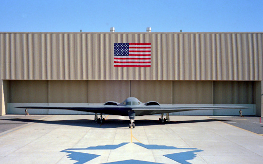 The B-2/ first public display in 1988 at Palmdale, California: in front of the B-2 is a star shape formed with five B-2 silhouettes