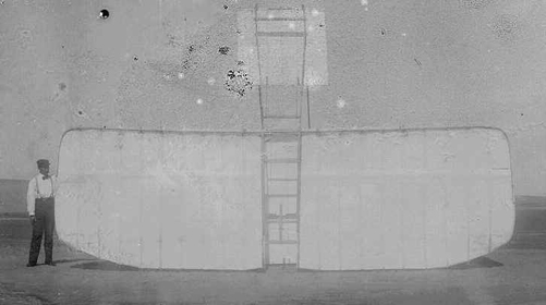 
Orville with the 1901 glider, its nose pointing skyward.