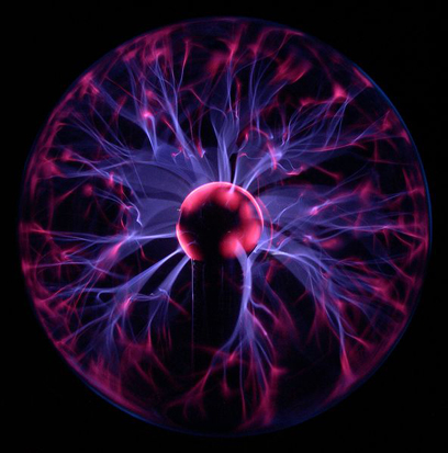 
Plasma lamp, illustrating some of the more complex phenomena of a plasma, including filamentation. The colours are a result of relaxation of electrons in excited states to lower energy states after they have recombined with ions. These processes emit light in a spectrum characteristic of the gas being excited.