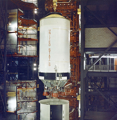 
The second stage being lowered into the first stage of a Saturn V rocket