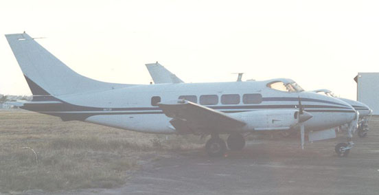 
Riley Dove with Lycoming engines and taller swept fin at Long Beach airport in April 1987