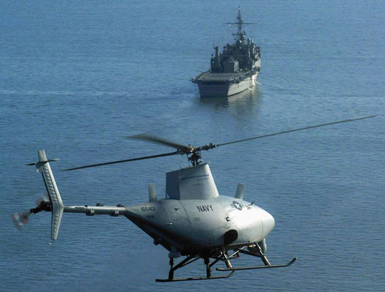 
A RQ-8A Fire Scout helicopter preparing to land on the USS Nashville