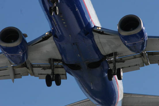 
Close-up of the engine nacelles of a 737 showing the flattened underside and triangular shape.