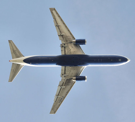 
Planform view of a British Airways 767-300 after take off, with retracted landing gear and partially deployed flaps.