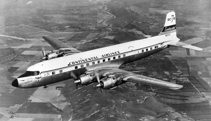 
A Continental Douglas DC-7 in flight, 1958