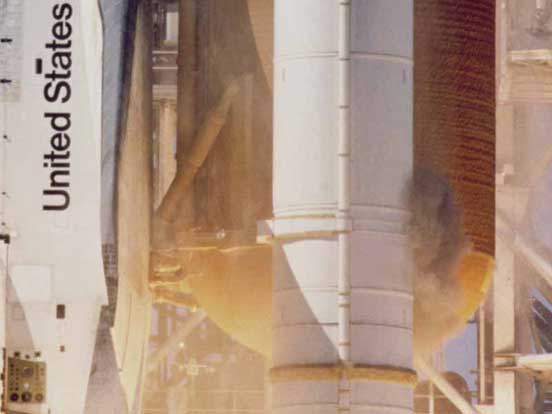 
Camera captures grey smoke emitting from the right-hand SRB on Space Shuttle Challenger before the start of STS-51-L.