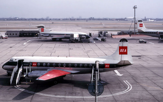 
British European Airways Vickers Viscount 802 at London Heathrow Airport in 1964. Behind it is a BEA Hawker Siddeley Trident and on the right a BEA Vickers Vanguard