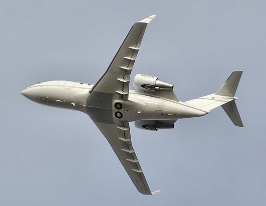 
Bombardier Challenger 601 shortly after take off. The main undercarriage wheels are left exposed during flight