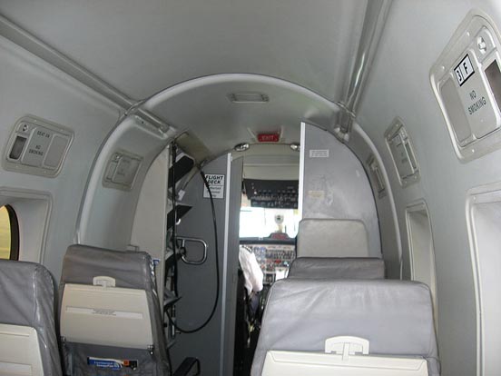
Facing forward in the passenger cabin of a CommutAir Airlines Beechcraft 1900D