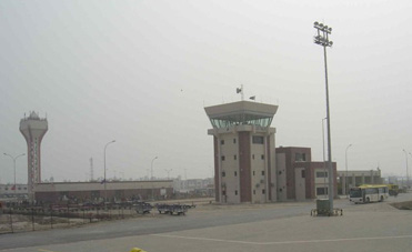 
Flood lights in front of the control tower at Sialkot International Airport, Pakistan