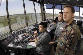 
Controllers survey the field at Misawa Air Base, Japan.