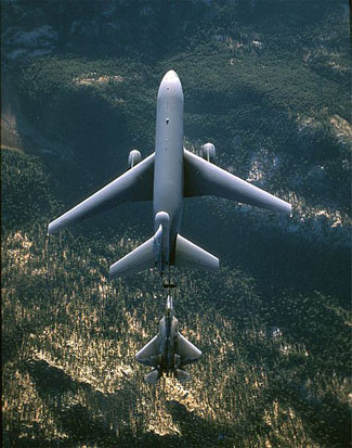 
A KC-10 Extender from Travis Air Force Base, California, refuels an F-22 Raptor