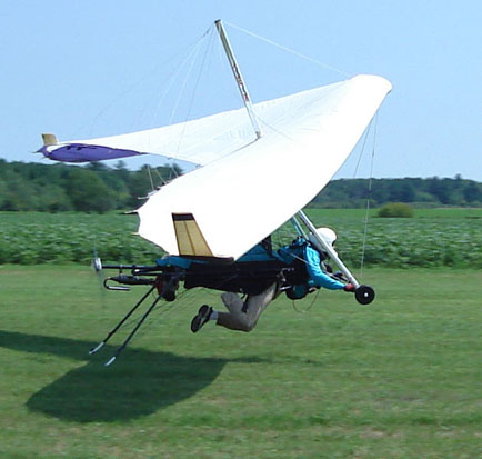 
Common takeoff mistakes: 1) The pilot quit running before establishing climb and, 2) He is pushing on the control bar while still at low speed, generating too much drag to accelerate and climb.