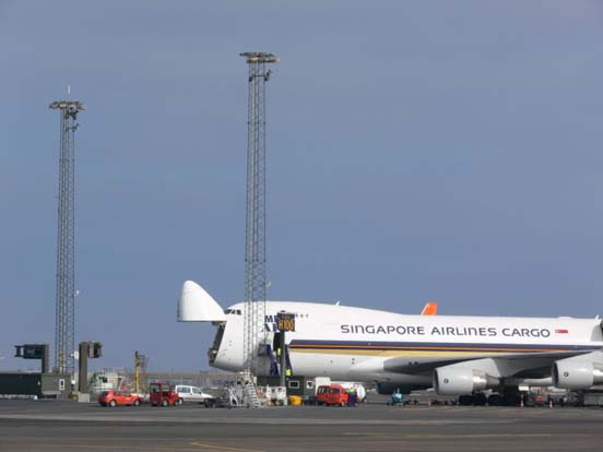 
Loading a Singapore Airlines Cargo Boeing 747 from the front .