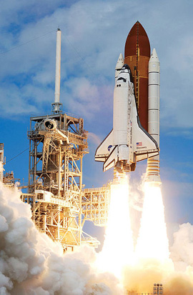 
Space Shuttle Discovery launches at the start of STS-120