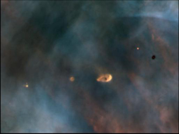 
Hubble image of protoplanetary disks in the Orion Nebula, a light-years-wide 